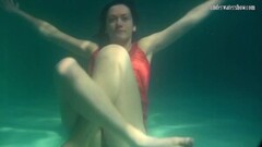 Naughty Red Dressed Mermaid Rusalka Swimming in The Pool Thumb